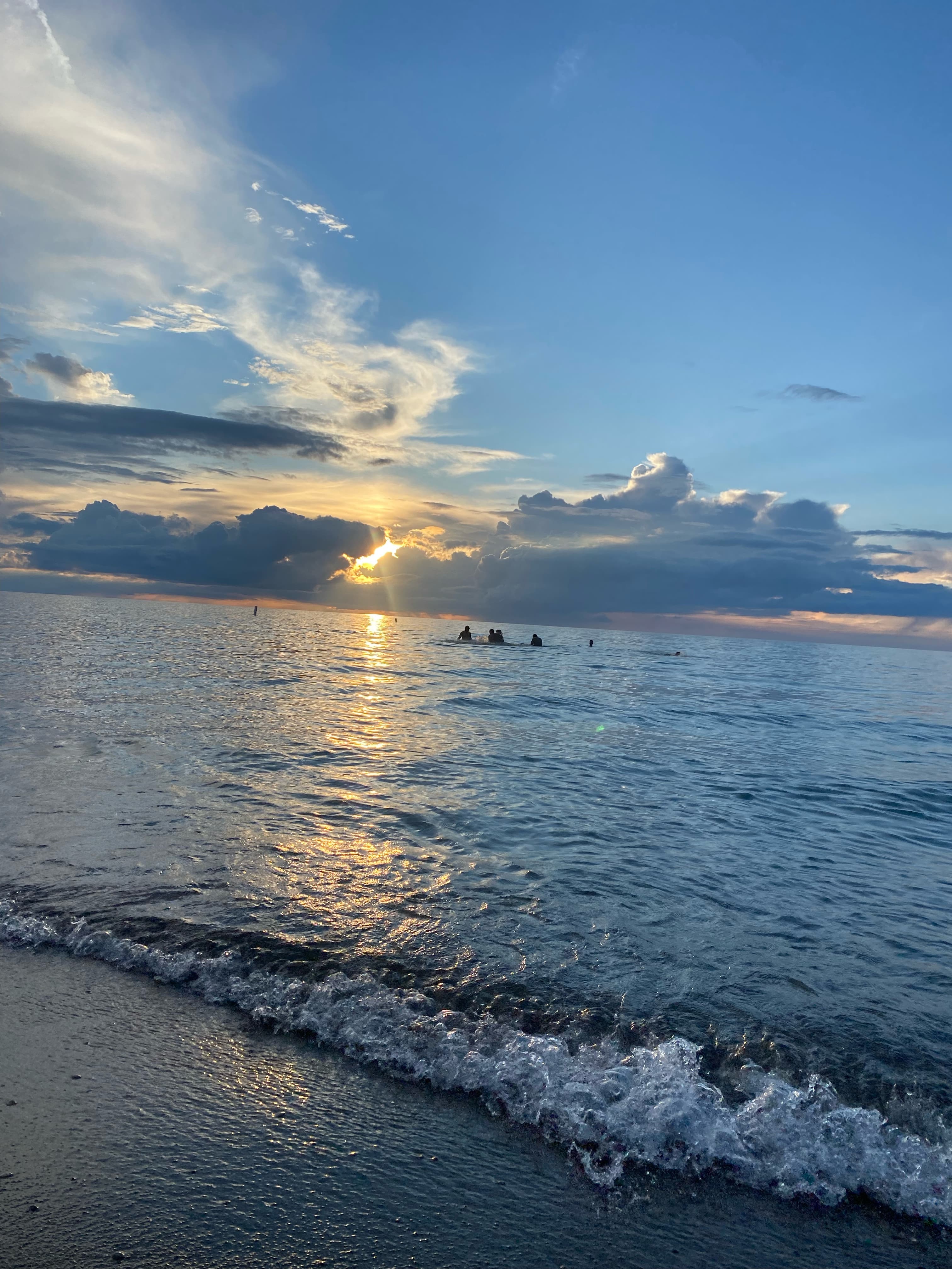 Sunset over the waves at Grand Bend beach
